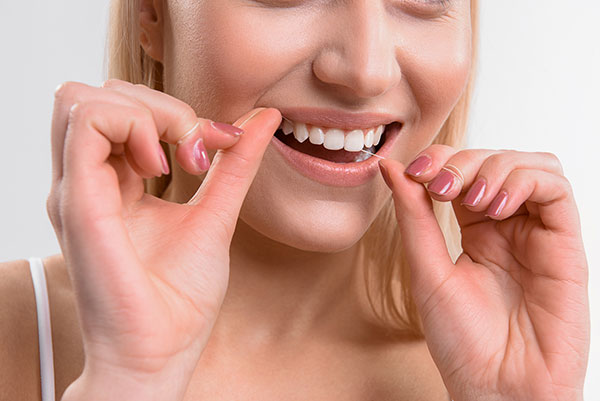 flossing teeth toronto dentist west village dental