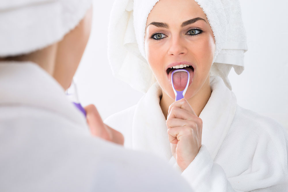 Learn The Importance of Cleaning Your Tongue